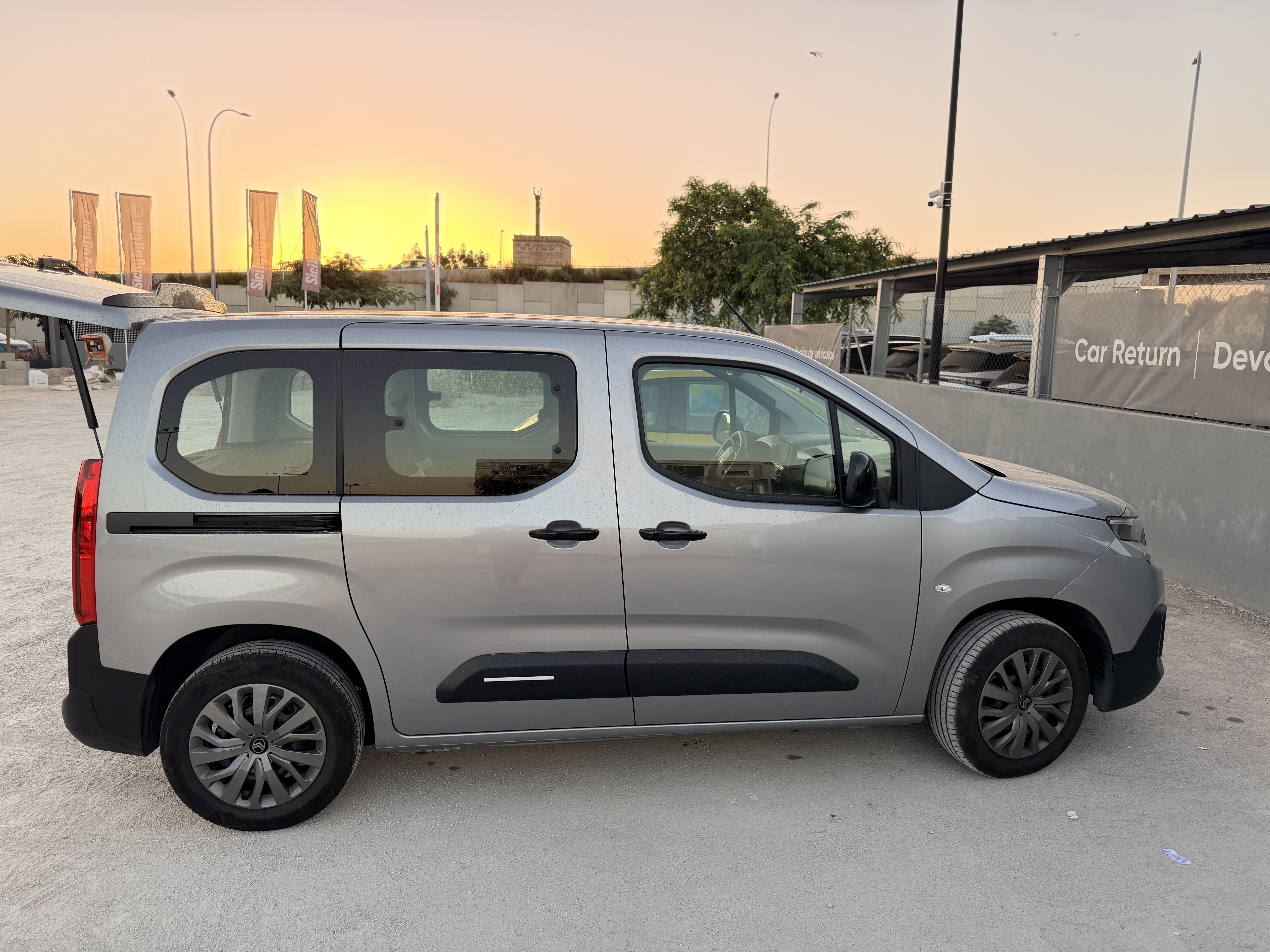 Citroën Berlingo side profile showing compact MPV size for cycling trips