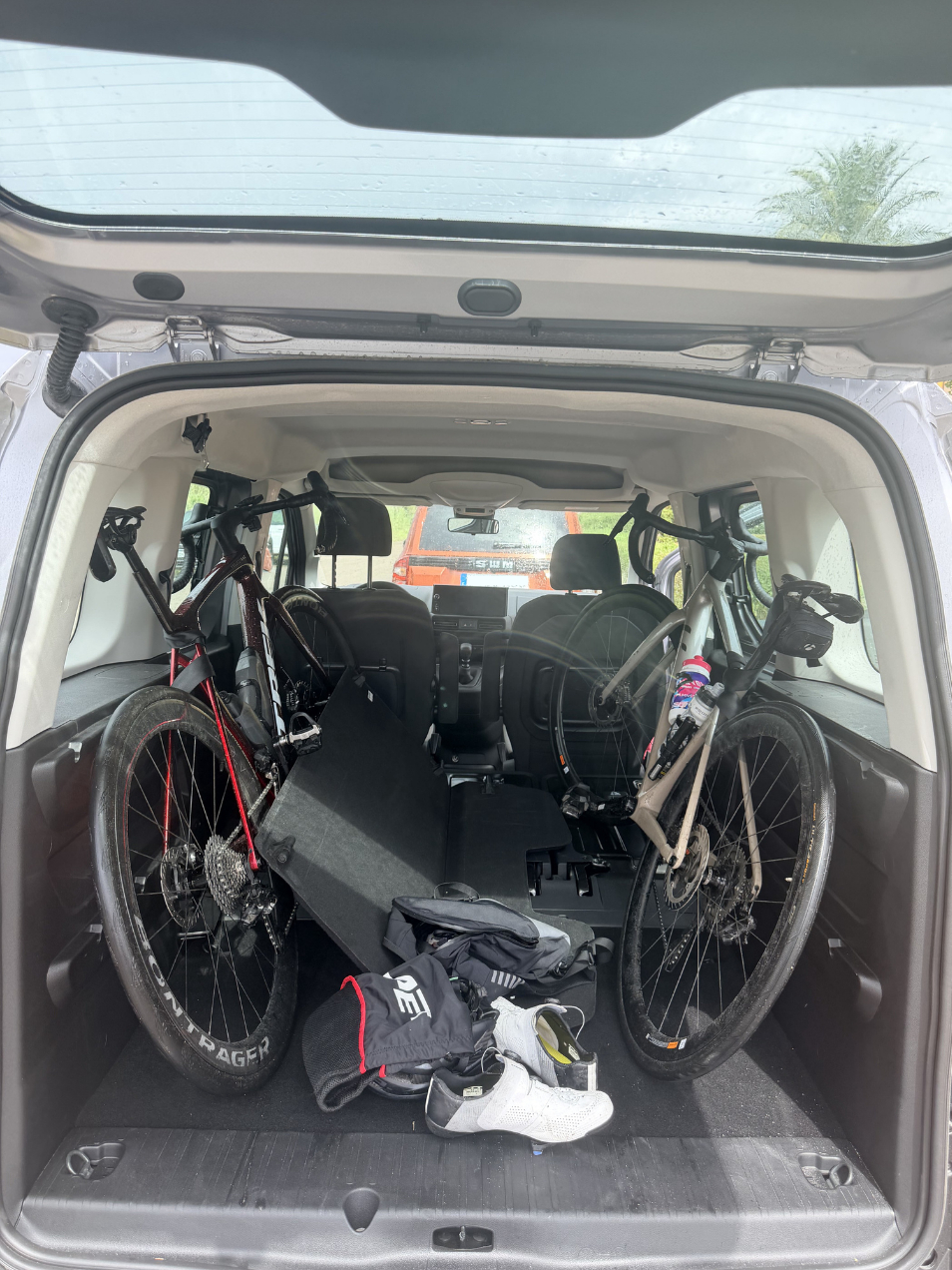 Trek Madone and hire bike loaded fully built into Citroën Berlingo with rear seats folded